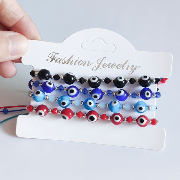 Handmade Turkish evil eye bead bracelet with colorful crystals on a braided rope chain, a stylish gift for women