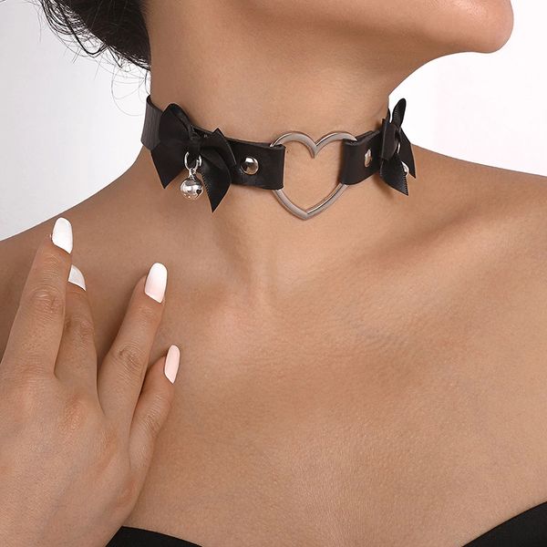 Heart choker necklace for women and girls, featuring a black leather spiked bowknot design, perfect as goth jewelry or festival accessories