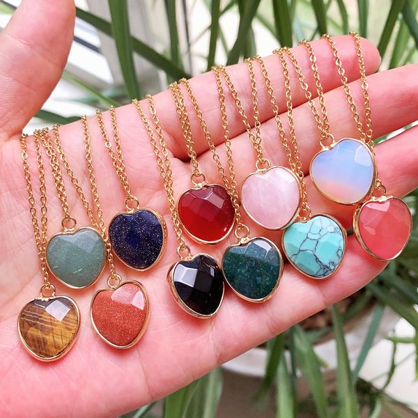 Heart pendant necklace featuring natural quartz stones in turquoise, opal, and pink crystal designs