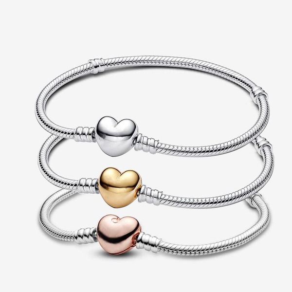 Heart-shaped clasp snake chain bracelet in 925 sterling silver, perfect for women and girls as wedding jewelry, featuring gold clips and presented in a retail box