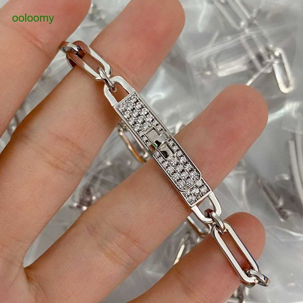 Hemres Designer Bracelet featuring a gold-plated Mijin pig nose design, fully adorned with diamonds, showcasing a high-quality square chain and button buckle