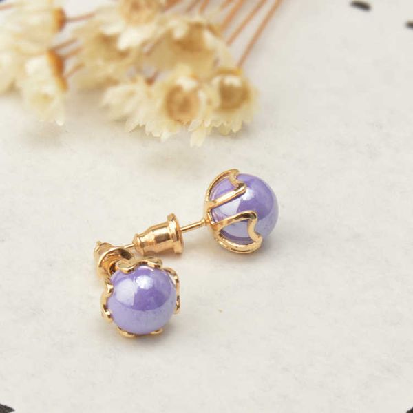 High-end imitation shell bead earrings with elegant silver jewelry design, featuring double-sided pearls for a VIP look