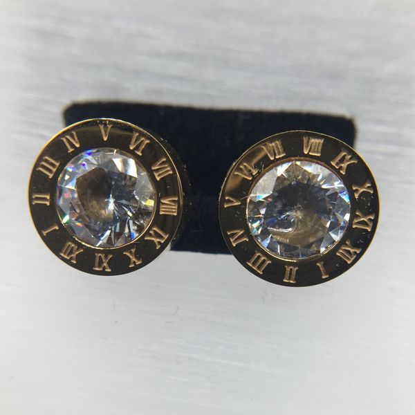 High-quality men's hip-hop jewelry featuring stainless steel Roman numeral stud earrings with simulated diamonds
