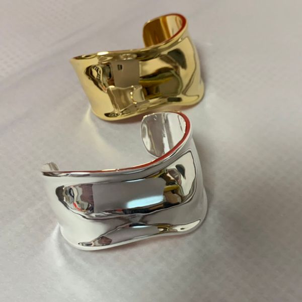 High-quality punk-style silver cuff bangle for women, trendy twisted bone bracelet perfect for parties and weddings