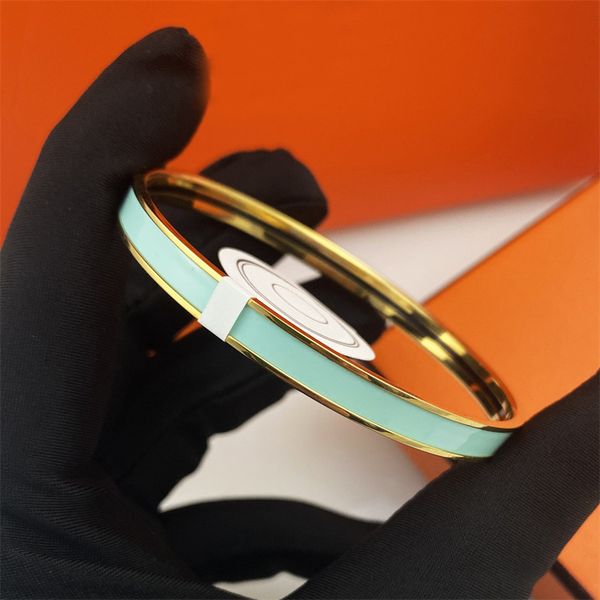 High-quality unisex luxury tennis bracelet in solid gold with toggle clasp, a stylish designer bangle for men and women, crafted from stainless steel