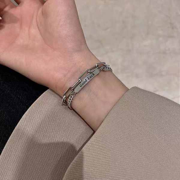 Hip-hop style dual-layer titanium steel bracelet with engraved letters that resist fading, a trendy unisex jewelry piece