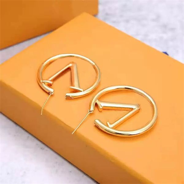Hot designer earrings featuring gold hoop charms for women, perfect for parties, weddings, engagements, and bridal jewelry in silver or gold