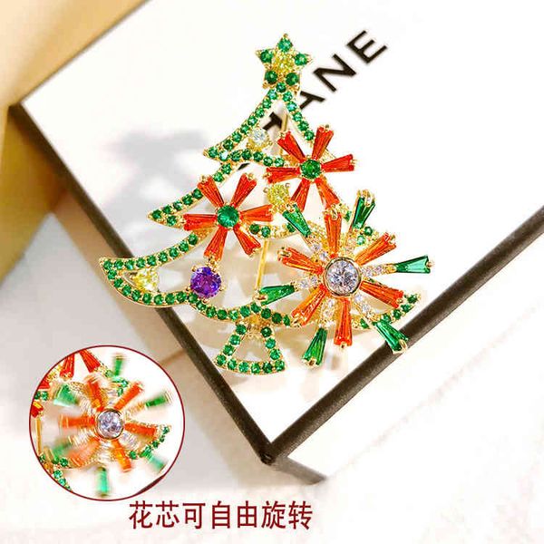 Japan and South Korea Christmas Tree Brooch Rotating for Men Women Versatile Clothes Accessories Pendant Coat Pin Buckle Collar  

Rewritten as:  
Rotating Christmas tree brooch from Japan and Korea, a versatile clothing accessory for men and women, suitable as a pendant, coat pin, or collar buckle