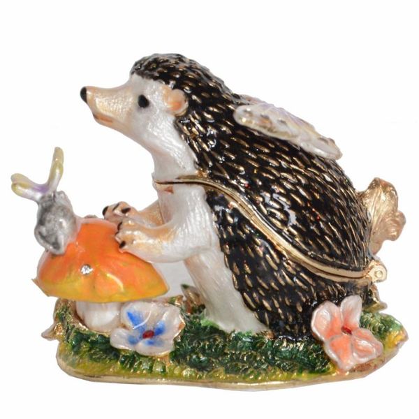 Jewelry pouches, hedgehog trinket boxes, and enameled collectible figurines with crystal accents