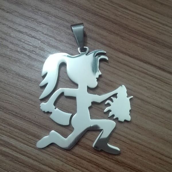 juggalette with hatchet-wielding girl charm featuring a man's head, ICP-inspired juggalo necklace