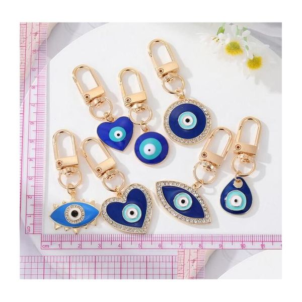 Keychain featuring blue evil eye charm and heart-shaped water drop design, a stylish Turkish lucky accessory for DIY or car use