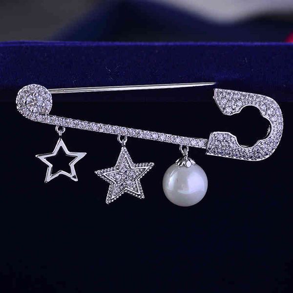 Korean creative brooch featuring a five-pointed star design, perfect for accessorizing silk scarves or securing suit waists