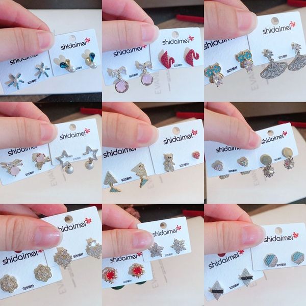 Korean fashion jewelry store offering 925 sterling silver stud earrings, perfect Valentine's Day gift set with 10 mixed hoop earring pairs