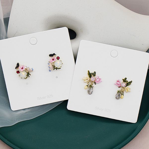 Korean S925 silver-plated enamel floral earrings featuring butterfly and diamond designs for women