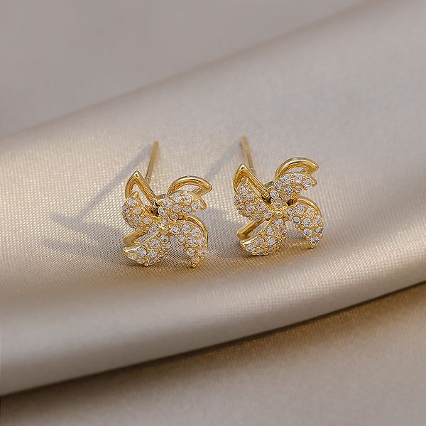 Korean trendy rotatable windmill-shaped zircon ear studs, stylish jewelry for women