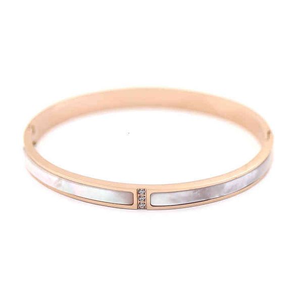 Korean-style charm bracelets with 56 stainless steel links featuring three diamonds, 14k rose gold plating, and natural white shell inlays