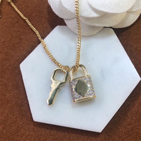 Lockable key pendant necklaces with elegant rhinestone detailing, presented in a gift box - perfect romantic jewelry for birthdays and special occasions