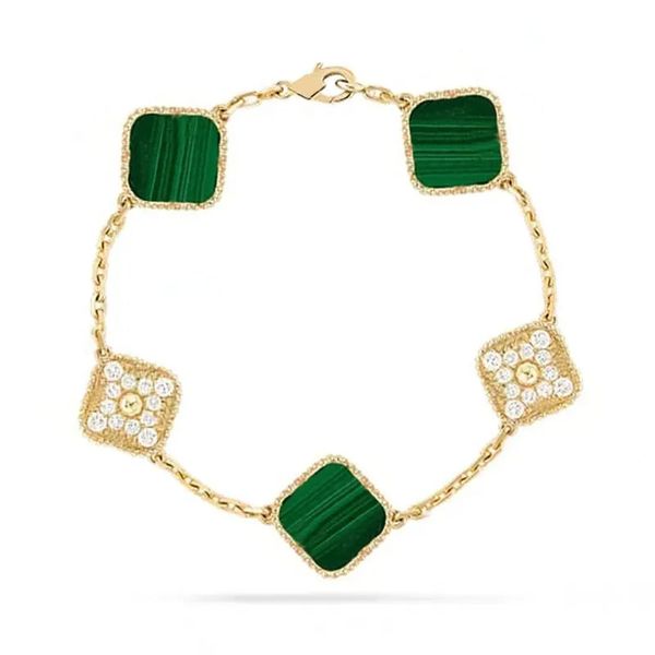 Luxurious 18K silver charm bracelet for women featuring mother of pearl and clover design, stainless steel plated