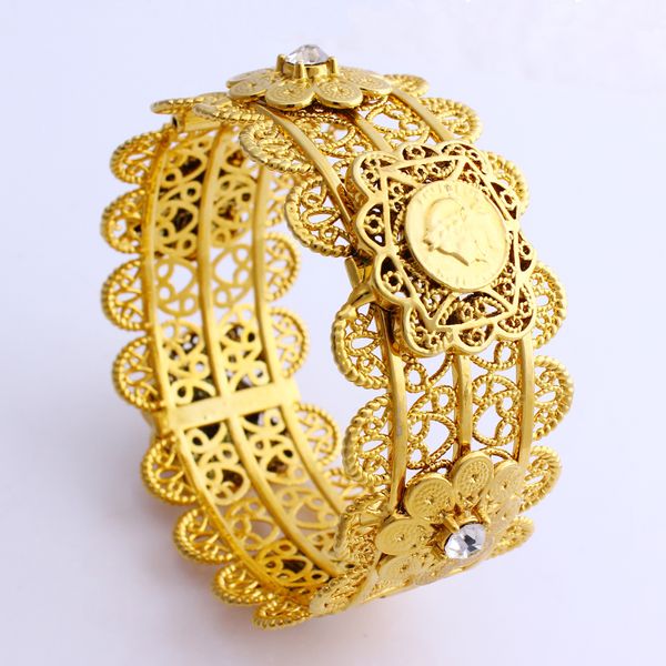 Luxurious 18k solid gold women's bangle with Thai Baht carving, CZ center, and Dubai-inspired African design
