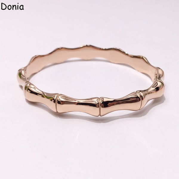 Luxurious Donia Jewelry bangle featuring a bold glossy bamboo design in premium titanium steel, a chic European-inspired fashion accessory perfect as an elegant gift bracelet  

Rewritten as:  
Stylish Donia Jewelry bamboo bangle with high-gloss finish in titanium steel, a trendy European designer bracelet ideal as a fashionable gift