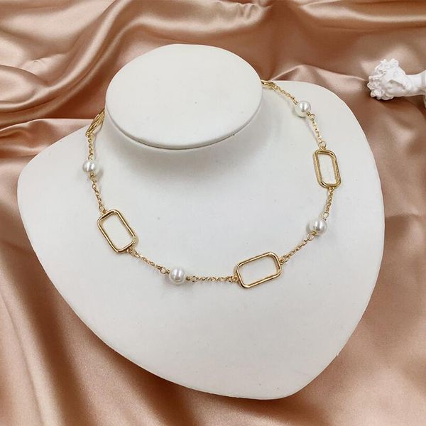 Luxurious gold-plated pendant necklace with pearls, a stylish jewelry accessory for women
