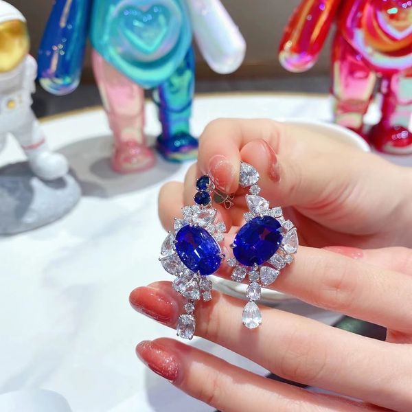 Luxurious sapphire and diamond dangle earrings in 925 silver, perfect for weddings, bridal gifts, or special occasions
