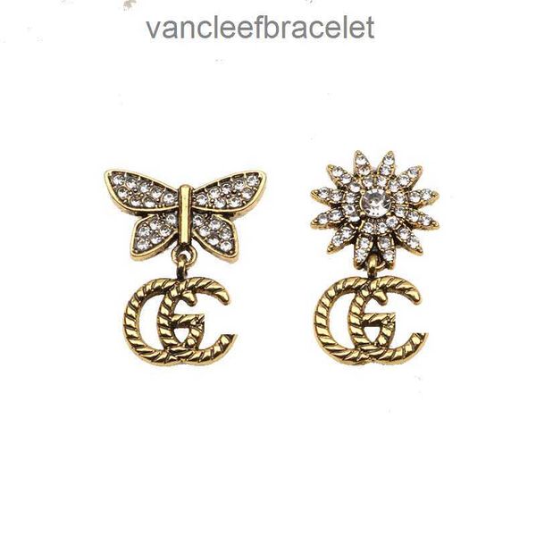 Luxurious sunflower-themed designer earrings for women, featuring 18K gold plating, elegant geometric shapes, and sparkling 925 silver crystal rhinestones