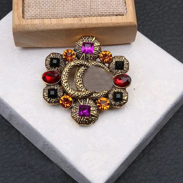Luxurious vintage-inspired designer brooches with sparkling gems, elegant women's jewelry for weddings and special occasions