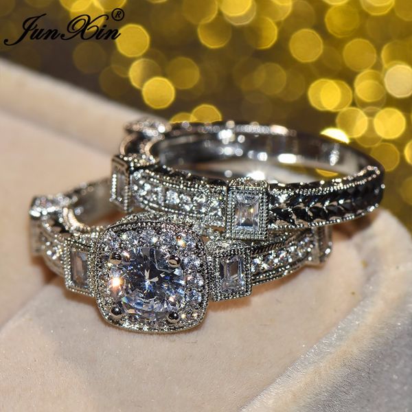 Luxurious women's diamond ring set in white gold, featuring a vintage design for weddings and engagements