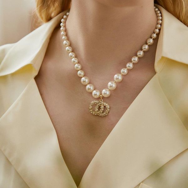 Luxury 18K gold-plated pearl necklace with diamond pendant featuring C and D letters for women's weddings