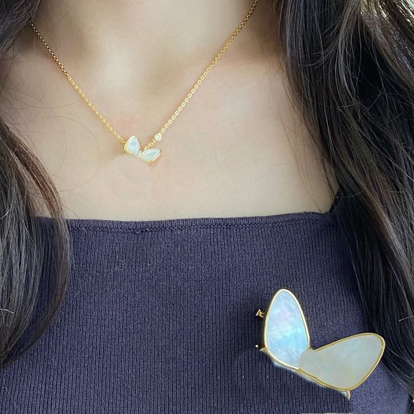 Luxury butterfly pendant necklaces for women in rose gold, platinum, or stainless steel with diamond and shell accents, perfect for weddings
