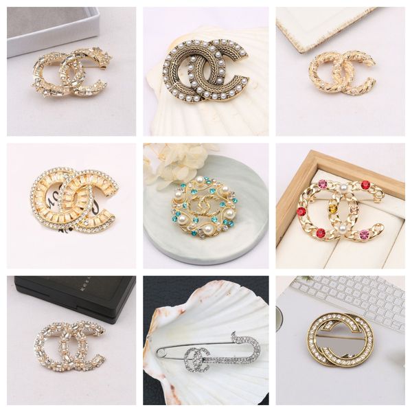 Luxury designer brooch brand letter pins with 18K gold plating, crystal rhinestone inlay, and pearl accents for unisex wear