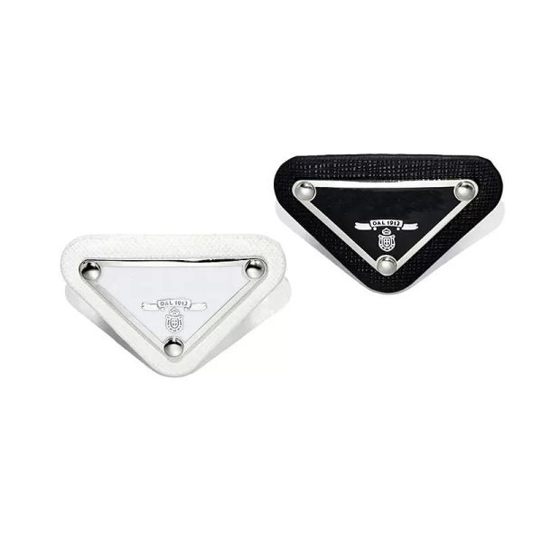Luxury designer brooches for men and women, featuring stylish letter pins and elegant triangle jewelry for suits and dresses