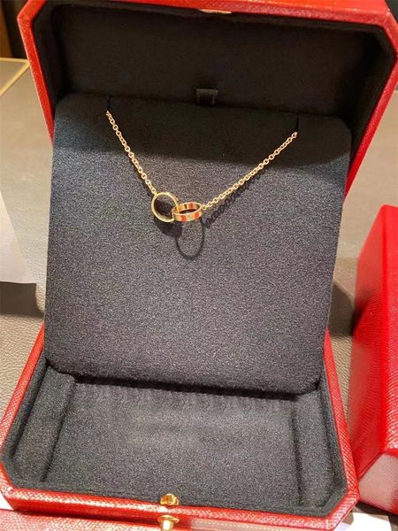 Luxury designer diamond screw love necklaces for men and women, featuring stylish double hoop chains with aesthetic pendants
