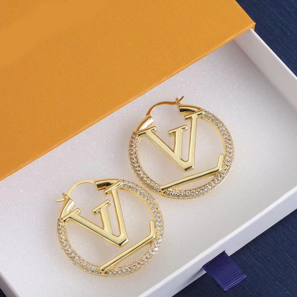 Luxury designer gold and diamond hoop earrings for women, perfect as a Christmas party gift or brand jewelry