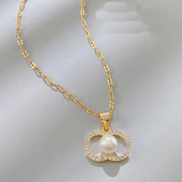Luxury designer letter necklaces featuring pearl pendants, elegant chains, and high-quality jewelry perfect for weddings and gifts