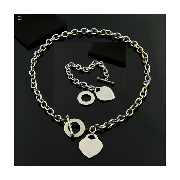 Luxury designer necklace and bracelet set with heart pendant, perfect for birthdays, Christmas, weddings, or as a statement jewelry piece
