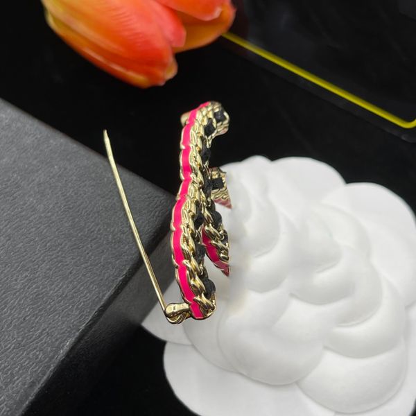 Luxury gold-plated designer brooch with pearl and diamond accents, perfect for weddings, parties, or as a premium couple's gift