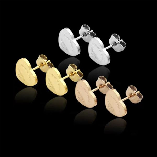 Luxury heart-shaped ear studs for women, crafted from 316L titanium with 18K gold plating, featuring a simple yet elegant design