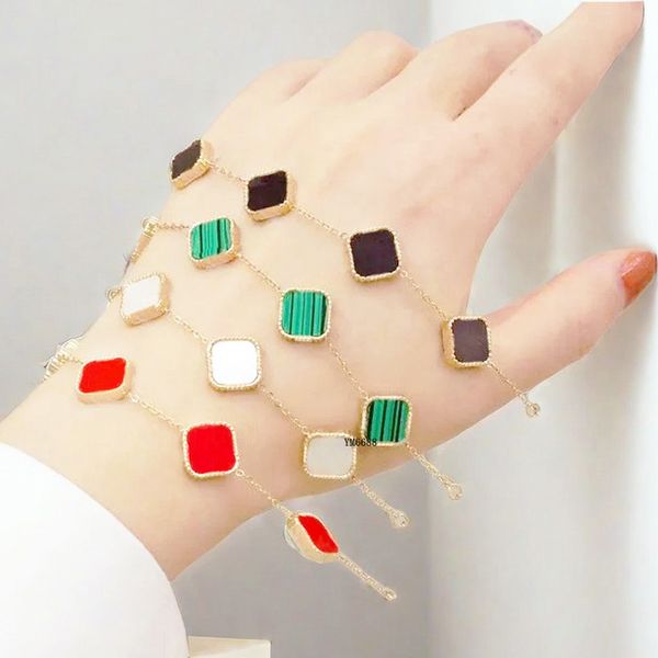 Luxury laser-engraved four-leaf clover bracelet, 18K gold-plated silver with malachite and onyx, tarnish-resistant fashion charm