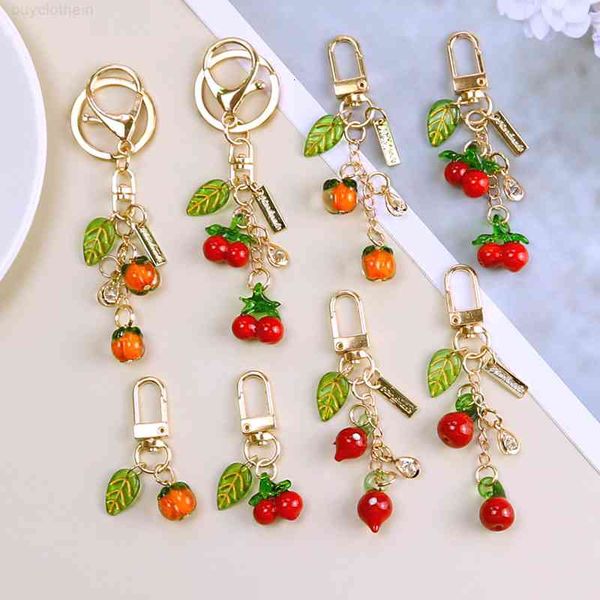 Luxury Lovely Cherry Car Key Chain with Persimmon Leaf Design - Creative Simulated Food Gift and Playful Airplane Bag Charm