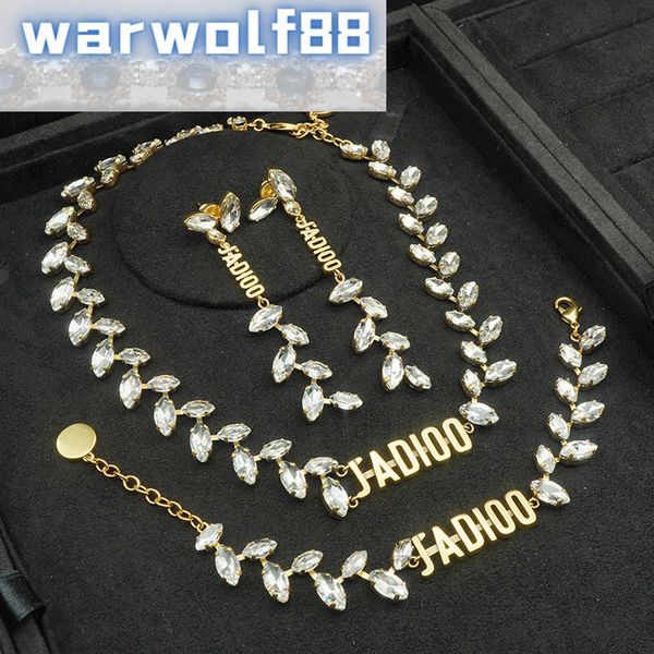 Luxury necklace designs featuring wheat ear, horse, letter, and eye motifs with matching chains, bracelets, and tassel rings in vibrant red