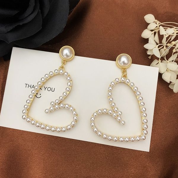 Luxury Pearl Love Earrings - Stylish Heart-Shaped S925 Silver Jewelry for Celebrities