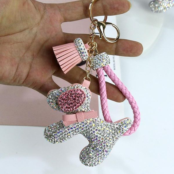 Luxury rhinestone dog keychains featuring cute cartoon animal designs, perfect as stylish bag or car accessories and thoughtful gifts for women during Christmas