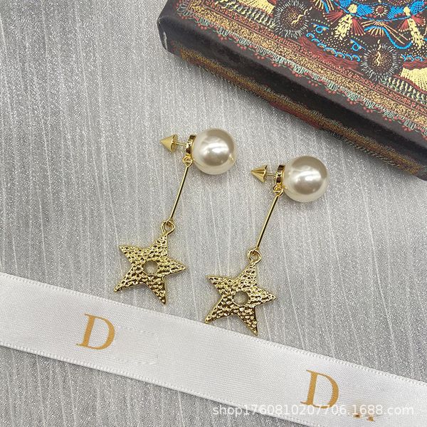 Luxury star-shaped tassel earrings with pearl accents, crafted in 925 silver for stylish women