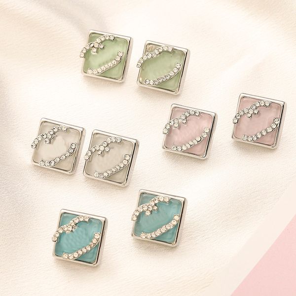 Luxury women's heart charm earrings in gold plating, stylish designer jewelry perfect as a couple accessory gift with elegant packaging