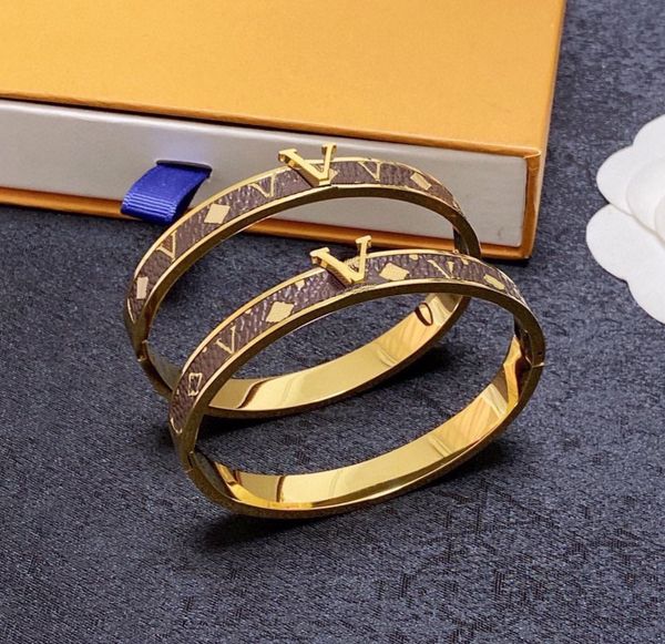 Men's and women's designer leather bangle bracelets with 18K gold plating, stylish stainless steel wristbands perfect for weddings and gifts