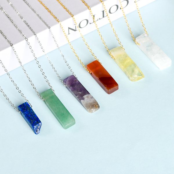 Natural irregular stone pendant necklace with healing crystals like quartz, amethyst, and fluorite for women and men