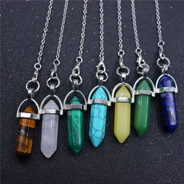 Natural Stone pendulum for dowsing and divination, a hexagonal quartz prism for energy healing and chakra balancing