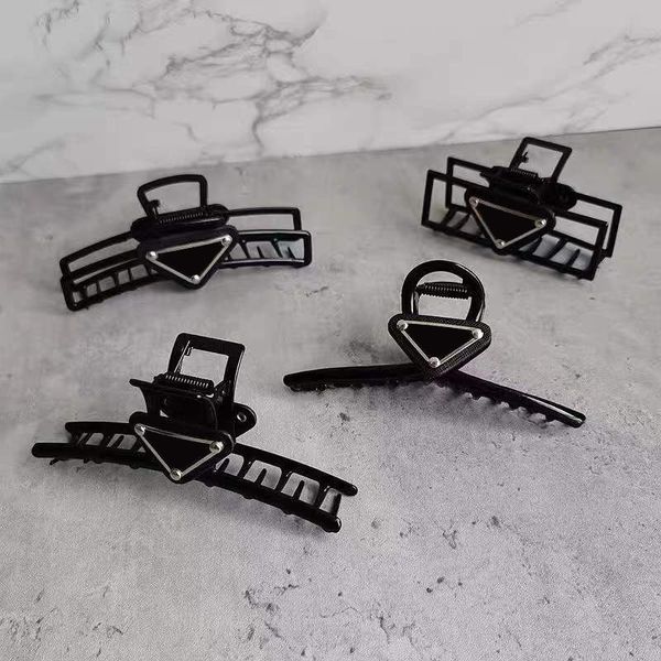 New stylish black geometric metal hair claw clip with vintage design for elegant women